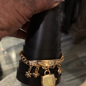 Elegant Gold Charm Bracelet with Watch Pendant